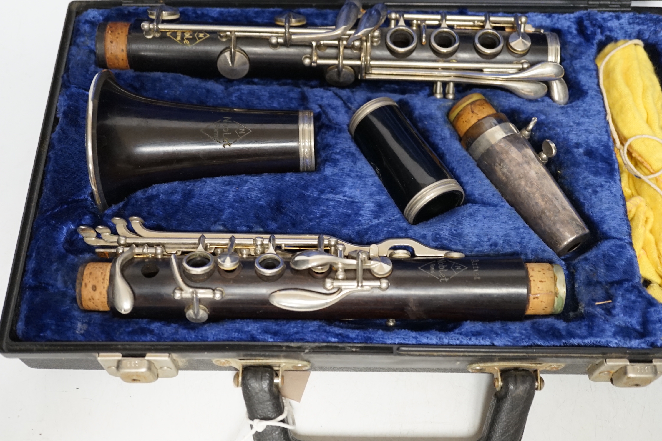 A cased French clarinet by Noblet, Paris